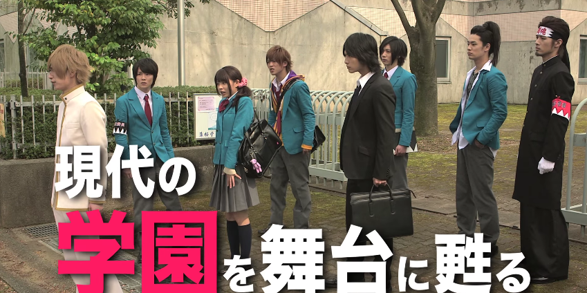 Alpha classmate stands before the crew.